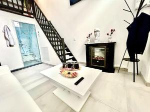 Appartements loft des desirs hammam, jacuzzi : photos des chambres