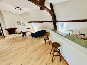 Appartements Centre-bourg, calme, familial, l-appart du Clocher : photos des chambres