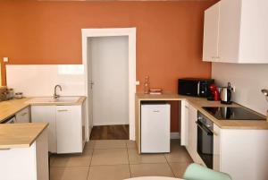 Appartements Joli appartement en centre-ville : photos des chambres