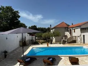 Family friendly apartments with a swimming pool Radasinovci, Biograd - 22312 - Drlićev Stan