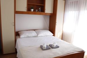 Family-friendly apartments with swimming pool Radasinovci, Biograd - 22312