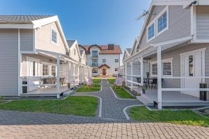 Domki i pokoje Angelo z sauną i jacuzzi- Karwia