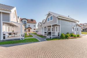 Domki i pokoje Angelo z sauną i jacuzzi- Karwia