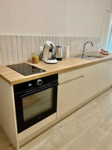 Appartements La Madeleine, T2 Coeur Ville : photos des chambres