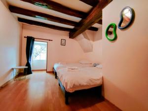 Maisons de vacances La Petite Fontaine- Sejour a Mige : photos des chambres