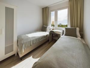 Przytulny Apartament z Parkingiem Blisko Morza w Gdyni by Noclegi Renters