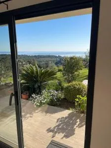 Rez de villa Machja vue mer et montagne à 2mn port - Togna