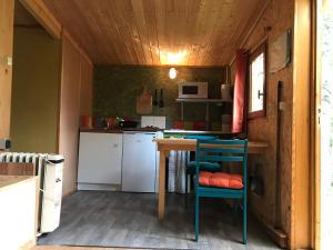 Chalets sous les arbres : photos des chambres