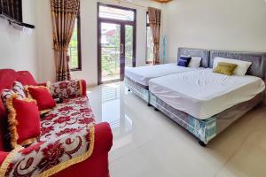 Urbanview Hotel Penginapan Ananda