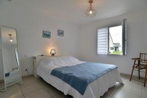 Maisons de vacances Ty Guen Braz - Charmante maison avec jardin : photos des chambres