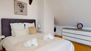 Appartements Triplex Le Bel Atre : photos des chambres