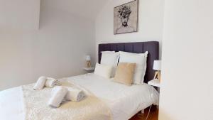 Appartements Triplex Le Bel Atre : photos des chambres