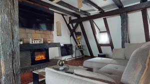 Appartements Triplex Le Bel Atre : photos des chambres