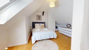 Appartements Triplex Le Bel Atre : photos des chambres
