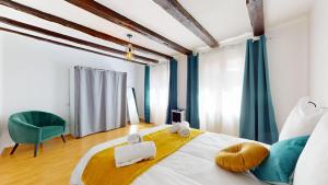 Appartements Triplex Le Bel Atre : photos des chambres