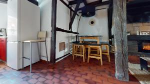 Appartements Triplex Le Bel Atre : photos des chambres