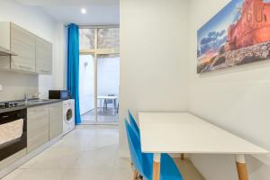 Cozy Studio with Private Backyard in Floriana by 360 Estates