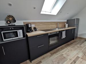 Appartements * Ty cocon * wifi * parking * moderne * : photos des chambres