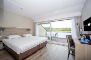 Comfort Double Room with Shower and Balcony room in Fletcher Zuiderduin Beachhotel