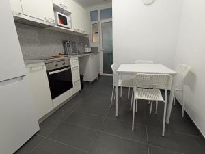 Sant Jordi Pisos - Dos de Maig