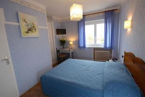 Hotels Hotel De La Ferte : photos des chambres