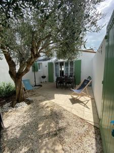 Maisons de vacances Charming house with garden in the heart of Saint Martin : photos des chambres