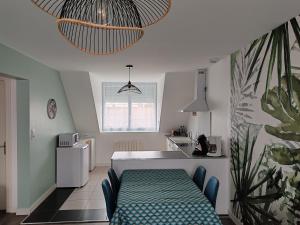 Appartements La maison rouge : photos des chambres