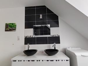 Appartements La maison rouge : photos des chambres