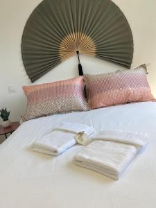 Appartements Un coin de paradis avec vue Mer et jardin : photos des chambres