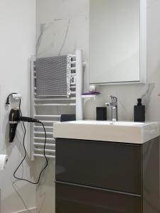 Appartements Un coin de paradis avec vue Mer et jardin : photos des chambres