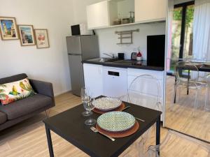 Appartements Un coin de paradis avec vue Mer et jardin : photos des chambres