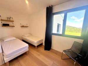 Villas Maison moderne avec vue imprenable - 5min du lac : photos des chambres