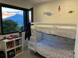 Villas Maison moderne avec vue imprenable - 5min du lac : photos des chambres