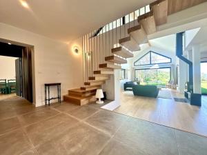 Villas Maison moderne avec vue imprenable - 5min du lac : photos des chambres