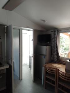 Campings MHVACANCES LOUENT PLUSIEURS MOBILHOMES DANS CAMPING 4 ETOILES PROCHE CHATEAUX et ZOO BEAUVAL : photos des chambres