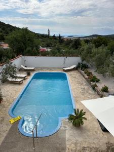 Apartment with pool 8 guests near beach Tisno Jezera Island Murter