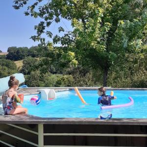 Maisons de vacances Chalet Meleze - Les Chalets de Barruerot - Spa jacuzzi privatif - Piscine en ete : photos des chambres