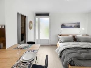 Appartements Studio entre Bordeaux et l-Atlantique avec Jacuzzi : photos des chambres