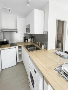 Appartements Studio entre Bordeaux et l-Atlantique avec Jacuzzi : photos des chambres