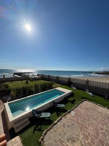 Oasis en la playa: piscina y relax - Semesterhus, Cullera