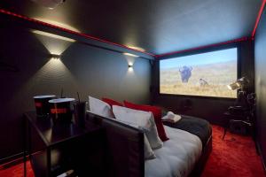 Appartements L-Oscar, Experience Cinema Room avec Netflix, Canal Plus, Prime Video chez les M by PRIMO C0NCIERGERIE : photos des chambres