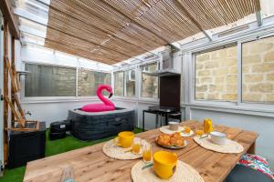 Maisons de vacances Maison familiale a 2 min a pied de l'Institut A Armand Calme Jeux babyfoot Jacuzzi Proche Mer : photos des chambres