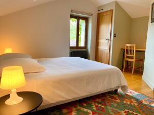 Maisons de vacances Maison avec jardin - L-Orangerie : photos des chambres