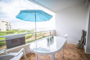 Appartements La Perle Bleue Vue sur mer-Terrasse-Parking-Plage Top ProsConciergerie Palavas-les-Flots : photos des chambres