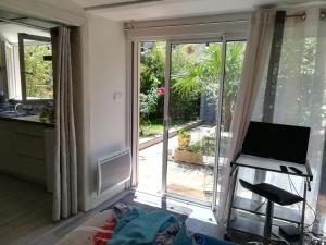 Charmant studio avec jardin