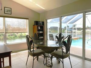 Relax with nature in our Waterfront 4 bedroom -HEATED POOL HOME-KING BED