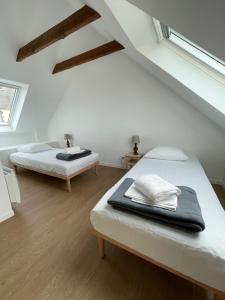 B&B / Chambres d'hotes Les Pingouins du Puits : photos des chambres