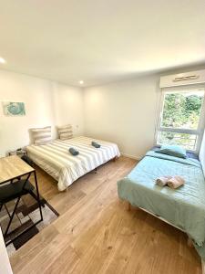 Appartements Grand T4 de 118m2 Proche Tram, Terrasse a seulement 25 mn des Plages : photos des chambres