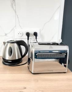 Appartements Cosy studio aux portes de Paris : photos des chambres