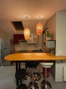Appartements Bel appartement rez de chaussee : photos des chambres